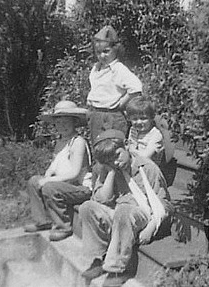 Joe (Frank) Vautier, Tony (Mike) Vautier, Dominic Vautier,  and Marie Vautier (standing). 