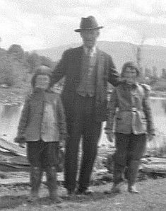 Pat Jessup (Paul's brother) stands with James Vautier and Danny Vautier.