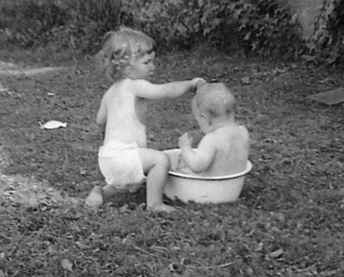 Michael Vautier gives Frank Vautier a bath
