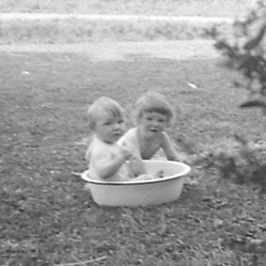 frank vautier getting a bath.  michael vautier assisting 