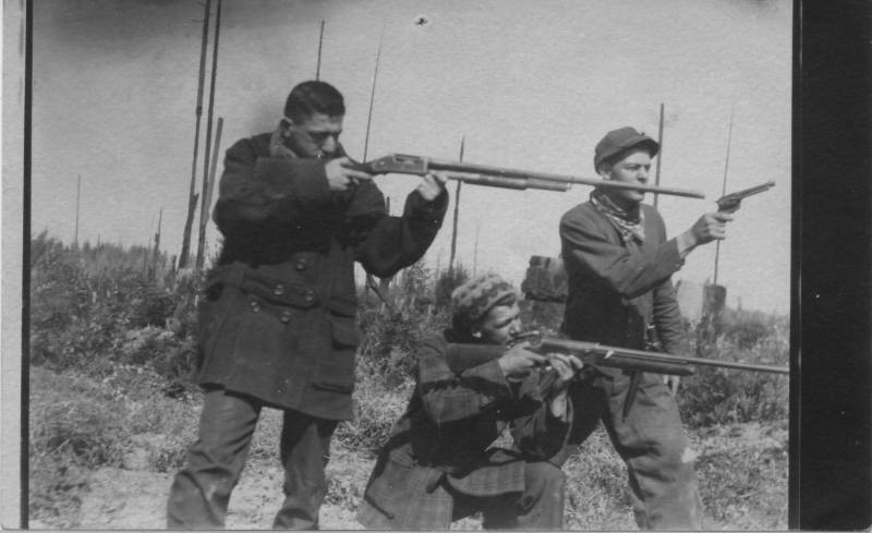 Vautier brothers shooting guns. Nothing on Back. I believe this is (l to r) Joe Vautier, George Vautier, and Eddie Vautier in Sequim WA