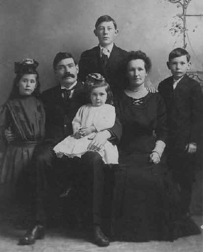 Allegra Catherine O'Rouark , James Edward O'Rouark, Ellen Alexander O'Rouark, Douglas James O'Rouark, Gerald Alexander O'Rouark (Standing in back), Elaine in Dad's lap