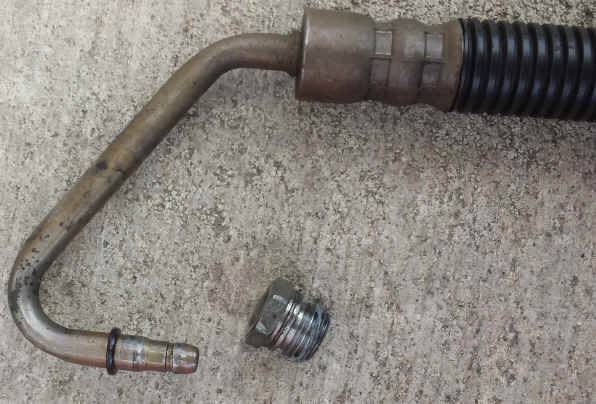 2001 ford escort failed high pressure power steering line.  